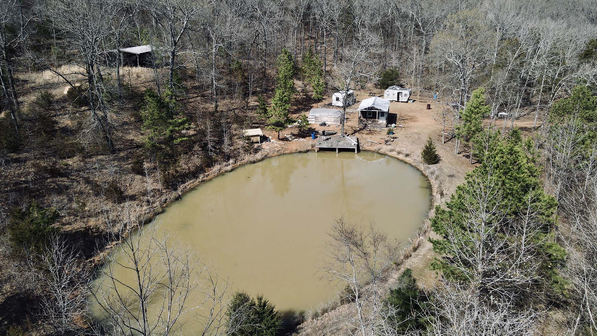 luke and dakota off grid drone shot of property