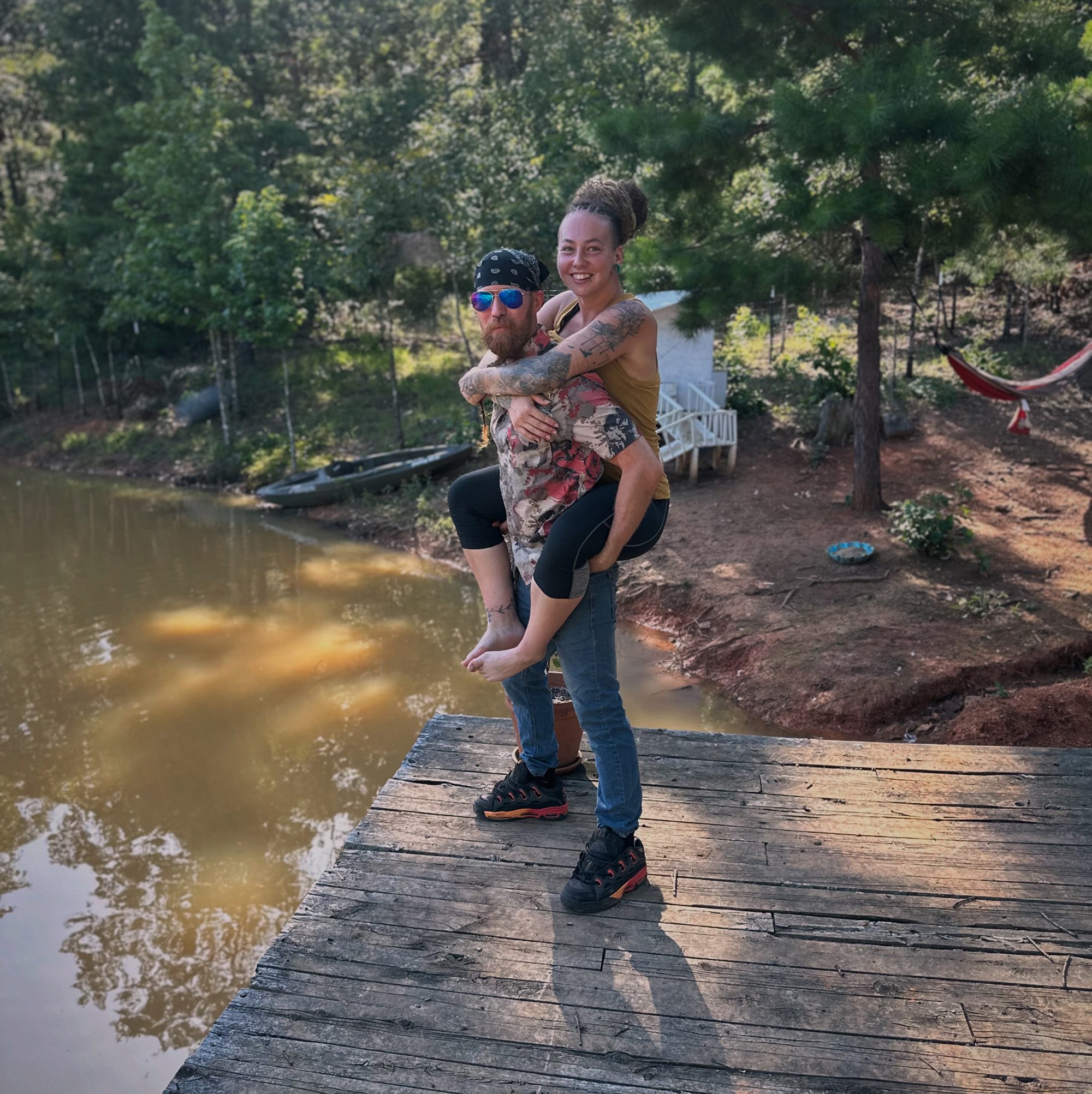 luke and dakota off grid standing on dock luke and dakota off grid standing on dock